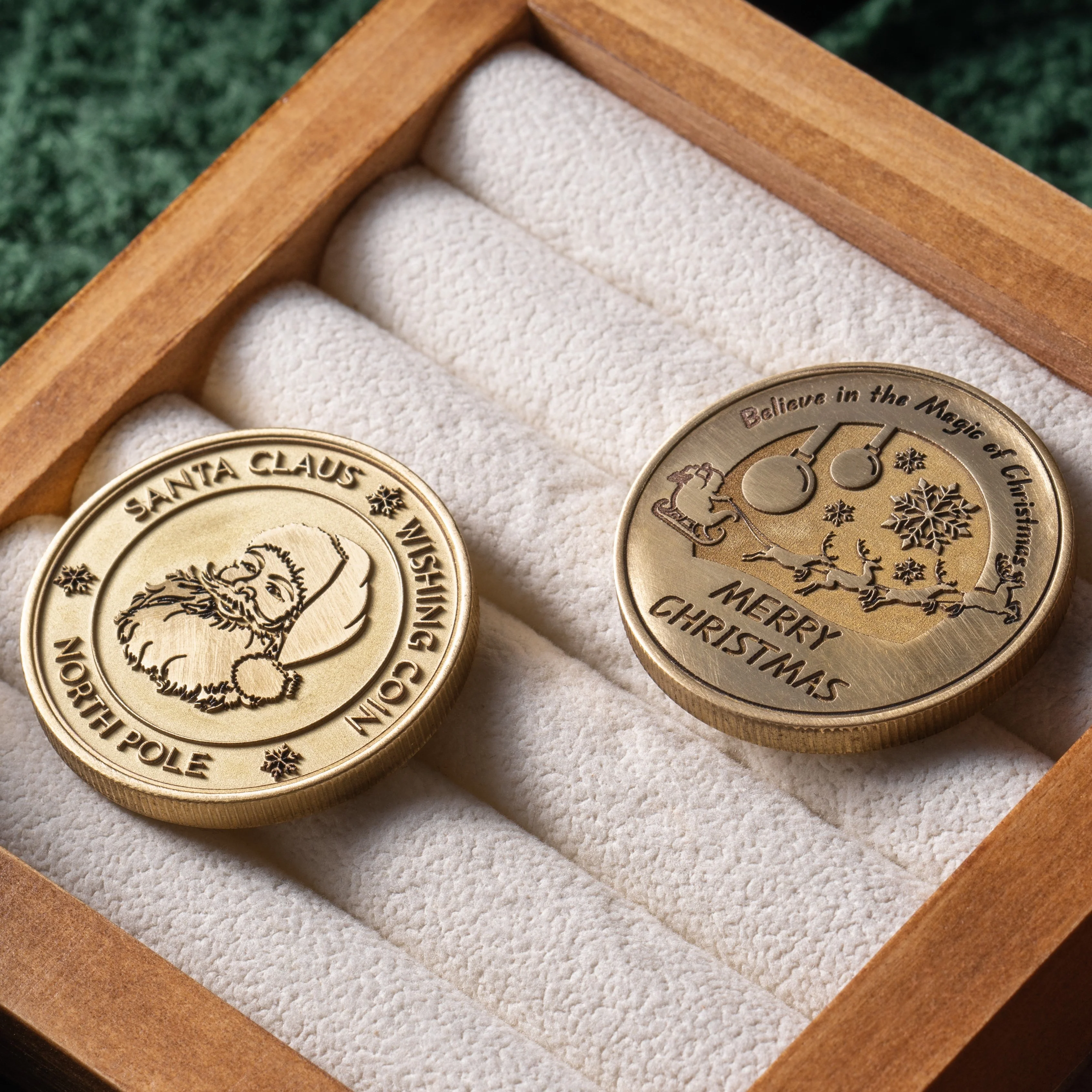 Finished engraved brass challenge coins with raised text and detailed artwork